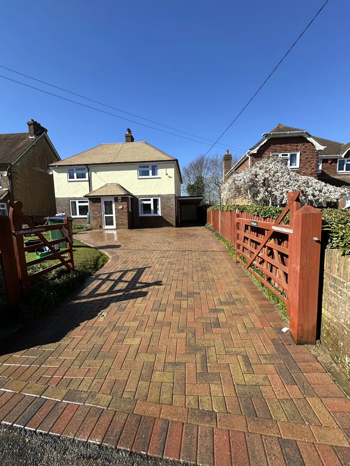 Block paving driveway after pressure washing by Sharps Exterior Cleaning, clean and restored